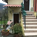 Ca' Rosina. Casetta Nel Bosco. Дом отдыха Ferrara di Monte Baldo